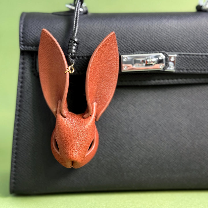 Minimalist Brown Lambskin Bunny Bag Charm — product photograph 1