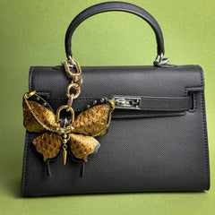 Vintage Gold Leather Butterfly Bag Charm — product photograph 2