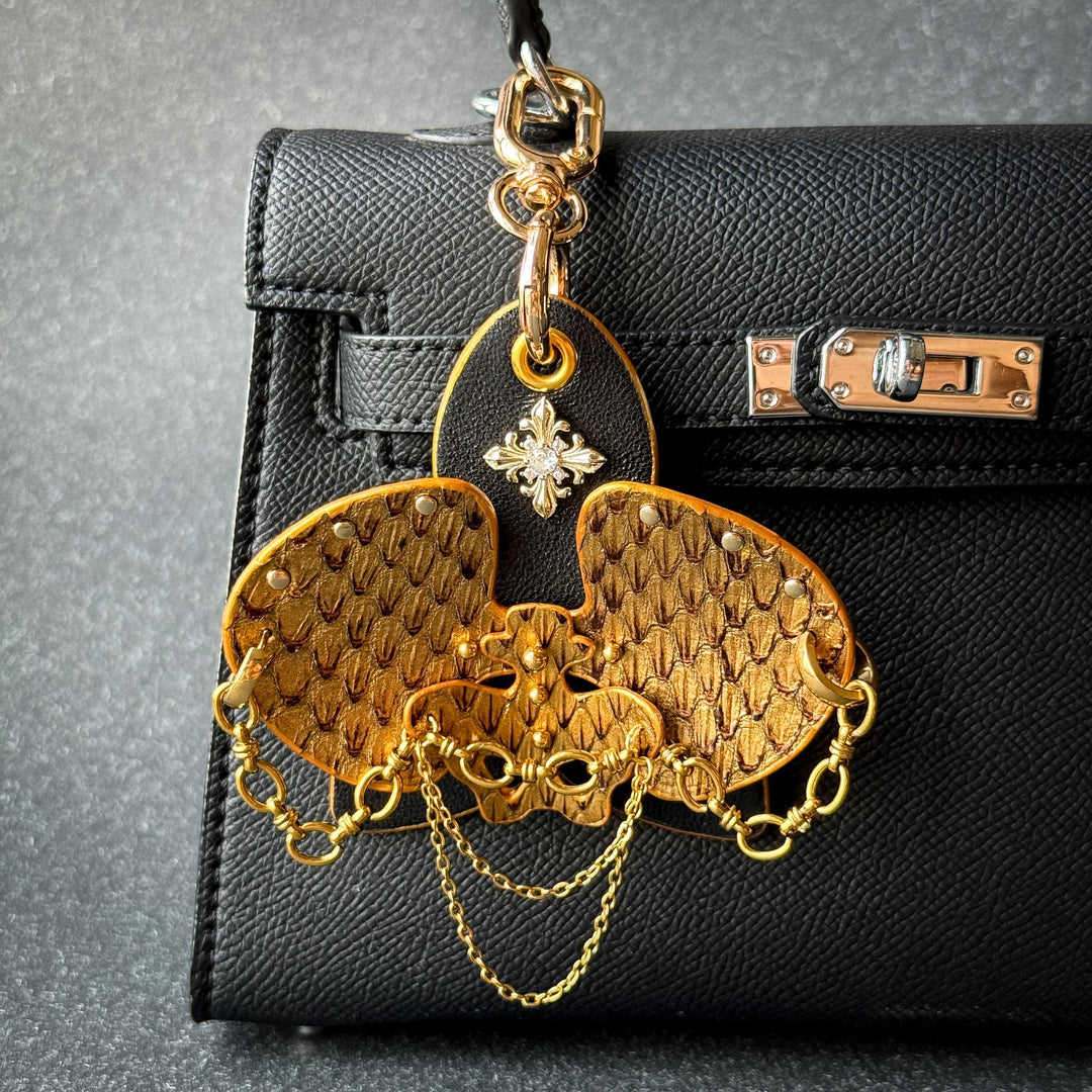 Vintage Gold Leather Orchid Bag Charm — product photograph 1